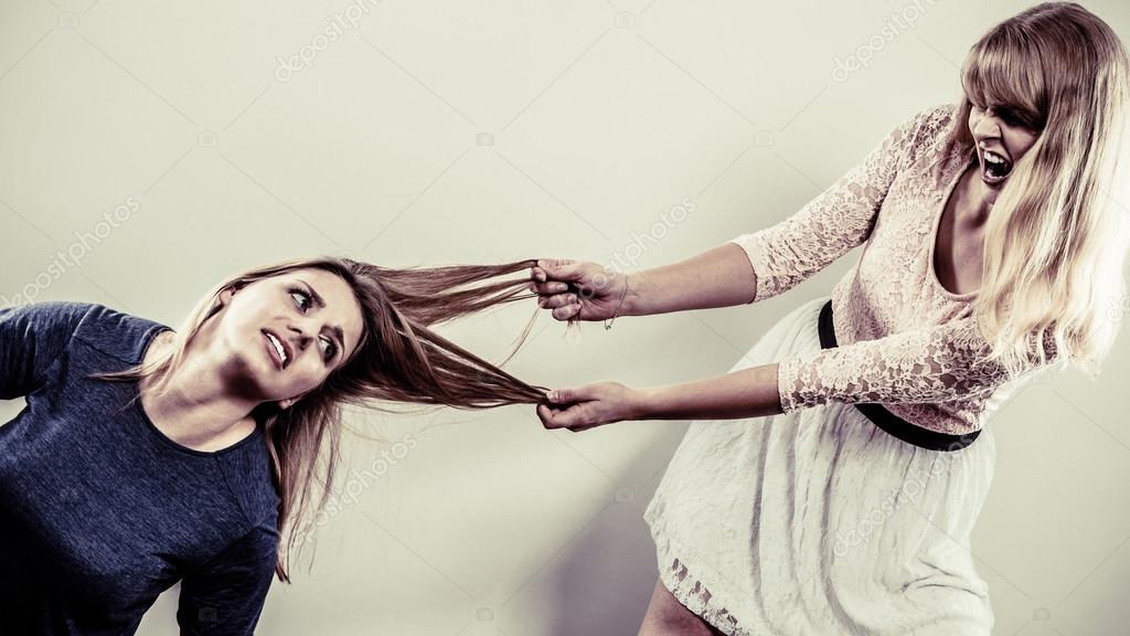 depositphotos_94719114-stock-photo-aggressive-mad-women-fighting-each.jpg