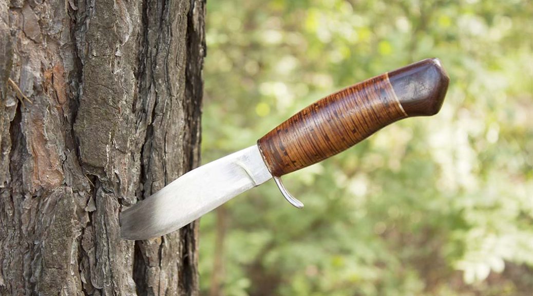 Нож-в-дереве-1038x576.jpg